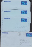 HONG KONG -  Five  $1.00 Dragon Aerogrammes - Four Are Mint And Small Type, One Is Used Large Type - Postal Stationery