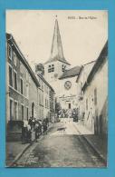 CPA Animée Rue De L'Eglise FOUG 54 - Foug