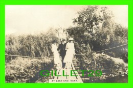 EAST END, SASKATCHEWAN - PEOPLES AT EAST END ON A BRIDGE - - Other & Unclassified