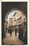 Fez - Rue Du Mellah Sous La Voute - Photo-Albert - Ciel Colorisé - Carte Non Circulée - Fez