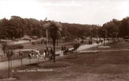 REAL PHOTLGRAPHIC POSTCARD - CENTRAL GARDENS - BOURNEMOUTH - COUPLE IN WW1 UNIFORM - Good Condition - Bournemouth (avant 1972)