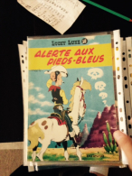 Lucky Luke Alertes Aux Pieds Bleus Réed Brochée - Lucky Luke