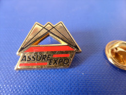 Pin's Arthus Bertrand - Assure Expo - Assurance (AA65) - Arthus Bertrand