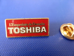 Pin's Arthus Bertrand - Toshiba - L'empreinte De Demain (AA57) - Arthus Bertrand