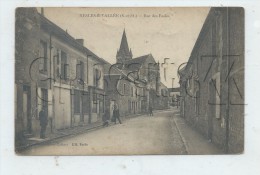 Nesles-la-Vallée (95) : La Rue Des écoles Prise Au Niveau De La Charcuterie Env 1918 (animé)  PF. - Nesles-la-Vallée