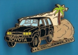 PIN´S //  ** TOYOTA ** 4 X 4  DE L´ANNÉE ** 1991 ** . (Arthus Bertrand Paris) - Toyota