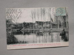 Ref5024 CPA Animée De Bray Sur Somme - Laie Des Barrières Hommes Sur Une Barque - Cliché Vitasse éd. Géomètre - Bray Sur Somme