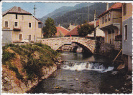 Delcampe - CPSM THONES 74 LE VIEUX PONT QUI ENJAMBE LE NOM ED CELLARD - Thônes