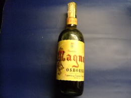 ANTIGUA BOTELLA BRANDY MAGNO CONTENIDO LITRO VINTAGE 1965 / 1975 - Licor Espirituoso