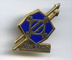 @+ Pin´s Interim Nation (signé Arthus Bertrand) - Arthus Bertrand