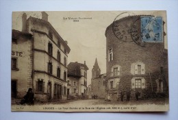 43- LOUDES - La Tour Ronde Et La Rue De L'église Animée - Loudes