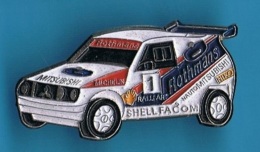 PIN´S //  ** RALLYE ** PARIS DAKAR ** MITSUBISHI ** ROTHMANS ** MICHELIN ** FACOM ** - Rally