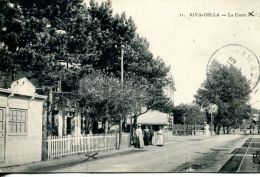 N°221 E -cpa Riva Bella -la Gare- - Gares - Avec Trains