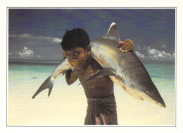 Asie > MALDIVES  (B) Islands White Tipped Shark Carried By A Young Child (enfant -requin à Pointe Blanche)   *PRIX FIXE - Maldives