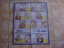 CALENDRIER PUBLICITAIRE EN COTON  - UAP - SIGNES DU ZODIAQUE -1985 - Grand Format : 1981-90