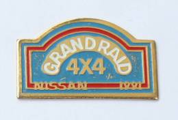 Pin´s  NISSAN - GRAND RAID 4X4 - 1991 - Ferrier - F584 - Rallye