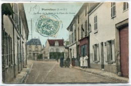 CPA 95  PIERRELAYE LA RUE DE LA GARE ET LA PLACE DU GAZON 1906 - Pierrelaye