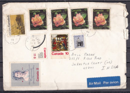 CANADA,   Airmail Cover From Canada To India, 10 Stamps, Multiple Cancellations, Queen, Roses - Storia Postale