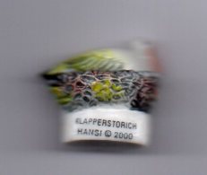 RARE Fève ALSACE - Cigogne Au Nid - HANSI 2000 KLAPPERSTORCH = Cigogne Blanche Avec Erreur D'inscription Klapperstorich - Regions
