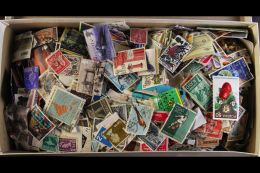 CHEAP STAMPS TIGHTLY PACKED IN SHOEBOX. An All World Mixture Of Chiefly Used Pictorials From Early To Modern,... - Other & Unclassified