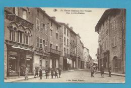 CPSM 36 - Commerces Rue Lucien-Dumas SAINT-JUNIEN  87 - Saint Junien