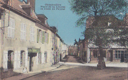 Chenérailles - Place De La Liberté Et Route De Peyrat (Hotel Poulet, Commerces, Garage Citroën) Circulé 1934, Convoyeur - Chenerailles