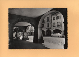 C1410 - REMIREMONT - 88 - Les Arcades De La Grand'Rue - L. MARIN Fabrique De Parpluies - Librairie G. BERETTA - Remiremont