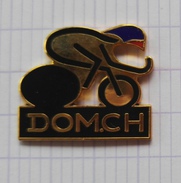 Delcampe - Pins Badge  Logo Cyclisme Sport Velo Dom.CH - Cyclisme