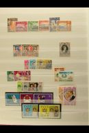 GIBRALTAR, GILBERT & ELLICE ISLANDS, HONG KONG, MONTSERRAT NEVER HINGED MINT SETS, A Collection In A Stock... - Other & Unclassified