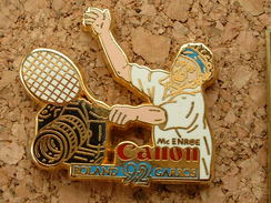 PIN'S  CANON CARTOUCHE BLEU - MC ENROE  - ROLAND GARROS 1992 - ARTHUS BERTRAND - Arthus Bertrand