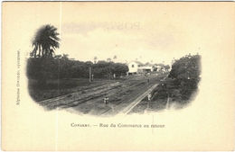 Carte Postale Ancienne De CONAKRY-rue Du Commerce Au Retour - Guinée