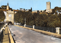 CPSM 30 SOMMIERES LE PONT SUR LE VIDOURLE PORTE MONUMENTALE ET LA TOUR    Grand Format 15 X 10,5 - Sommières