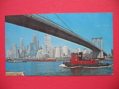 BROOKLYN BRIDGE,NEW YORK CITY - Tugboats