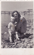 Mother And Kid At Seaside - Photographs