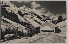 Die Neue Kirche In Achseten Bei Frutigen, Weisse Fluh Und Hohnlesen Im Winter En Hiver - Photo: E. Gyger No. 11476 - Frutigen