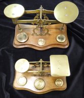 POSTAL SCALES 19thC Two Early Sets Of Brass Scales On Wooden Serpentine Boxes, Each Having Three Or Four Weights (one Se - Other & Unclassified