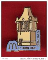 22107-pin's Mcdonald's.chartres.l'horloge..signé ID Action. - McDonald's