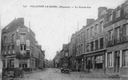 CPA - VILLAINES-la-JUHEL (53) - Aspect De La Grande-Rue ,du Grand Café Et De L'Hôtel Du Lion Dans Les Années 20 - Villaines La Juhel