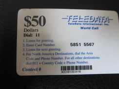 TeleDate World Call Remote Phonecard, 50$ Facevalue In Black Color And Text In Blue Color,used For U.N. Force In Angola - Angola