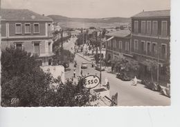 CPSM Saïda - L'avenue Foch (avec Animation Devant Station ESSO) - Saida