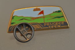 REF M1  : Pin's Pin ARTHUS BERTRAND : Theme Automobile Peugeot Open A Système - Arthus Bertrand