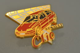 REF M1  : Pin's Pin ARTHUS BERTRAND : Theme Automobile Renault CLIO ROUGE - Arthus Bertrand