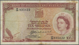 02027 Rhodesia & Nyasaland: 10 Shillings 1961 P. 20, Used With Folds And Stain In Paper, 2 Pinholes, No Tears, Still Nic - Rhodésie