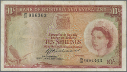 02028 Rhodesia & Nyasaland: 10 Shillings 1961 P. 20, Used With Stronger Folds, Stain In Paper, One Minor Hole, Condition - Rhodesia