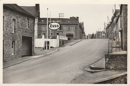 PLOUGUENAST  - Une Rue ( Station D'essence Esso ) - Autres & Non Classés