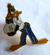 PIN'S DEMONS ET MERVEILLES 1990 TUNER DAFFY DUCK DOLLARS - Cinéma