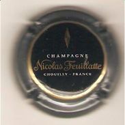 CAPSULE MUSELET CHAMPAGNE  NICOLAS FEUILLATTE CHOUILLY FRANCE (blanc Et Or Sur Noir Contour Gris) - Feuillate