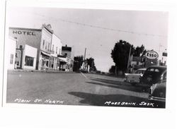 MOSSBANK, Sakatchewan, Canada, Main Street North, Ford & Esso, 1950's.  RPPC - Other & Unclassified