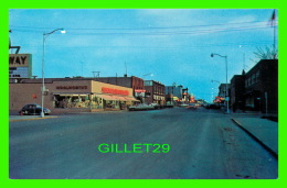 DAUPHIN, MANITOBA - DAUPHIN MAIN STREET AT DUSK, LOOKING SOUTH  -  PHOTO, R. J. BOB SNAZEL - - Dauphin