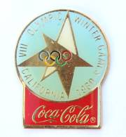 Pin's  COCA COLA - VIII° Olympic Winter Games - CALIFORNIA 1980 - Etoile  - Anneaux Olympiques  - G1078 - Coca-Cola